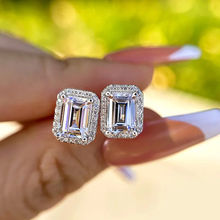 Sparkle Halo Emerald Cut Women's Stud Earrings In Sterling Silver