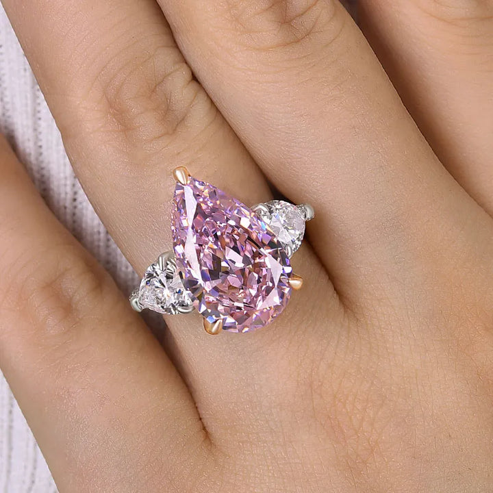 Gorgeous Pear Cut Pink Sapphire Three Stone Engagement Ring