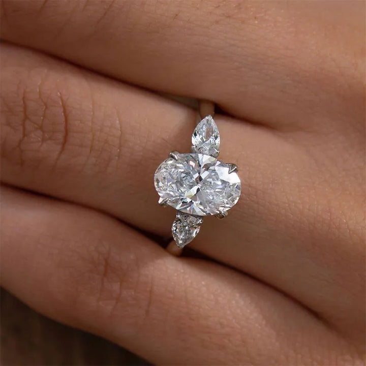 Noble Oval Cut Three Stone Engagement Ring