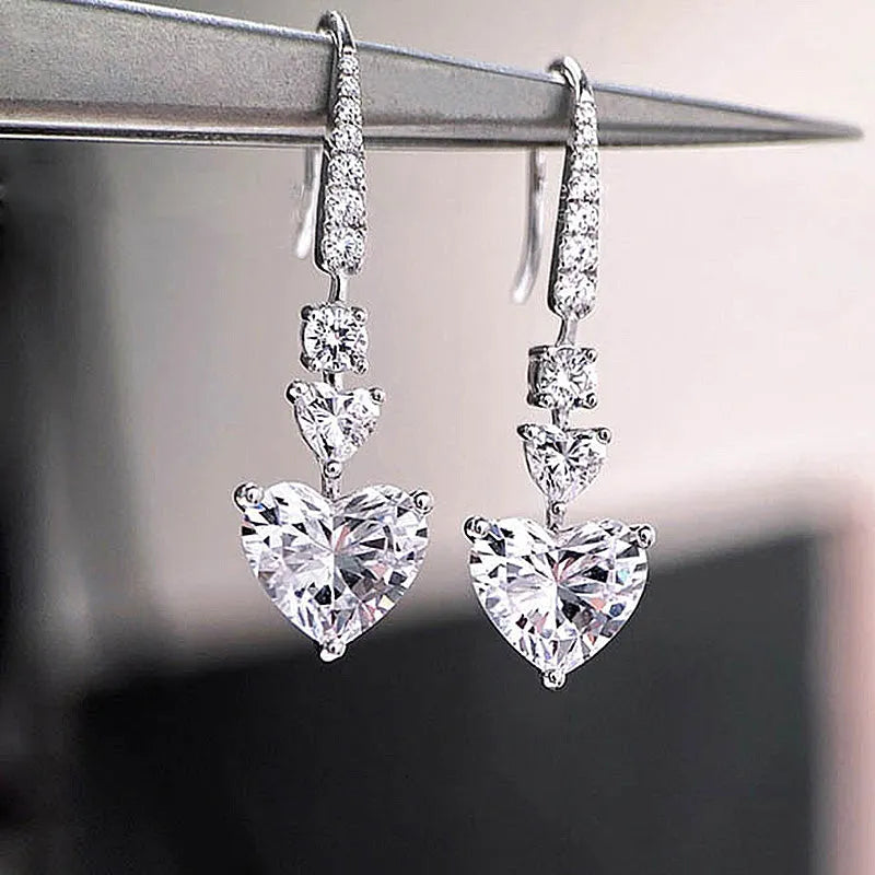 Stunning Heart Cut Women's Stud Earrings In Sterling Silver