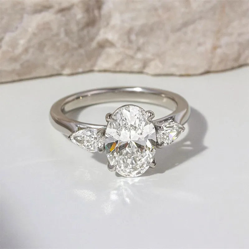 Noble Oval Cut Three Stone Engagement Ring