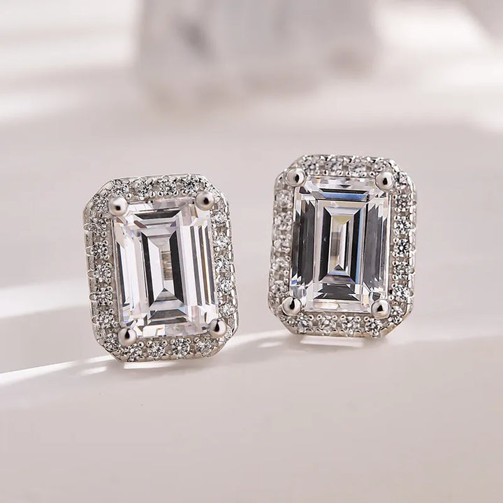 Sparkle Halo Emerald Cut Women's Stud Earrings In Sterling Silver