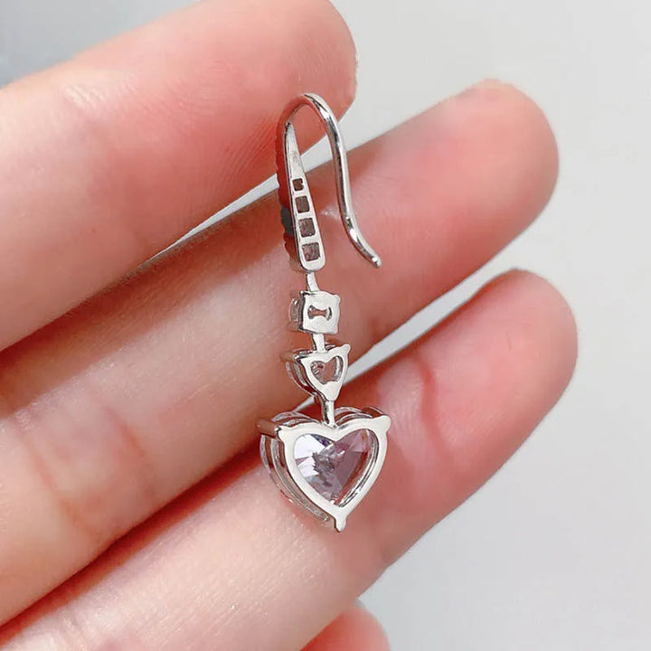 Stunning Heart Cut Women's Stud Earrings In Sterling Silver