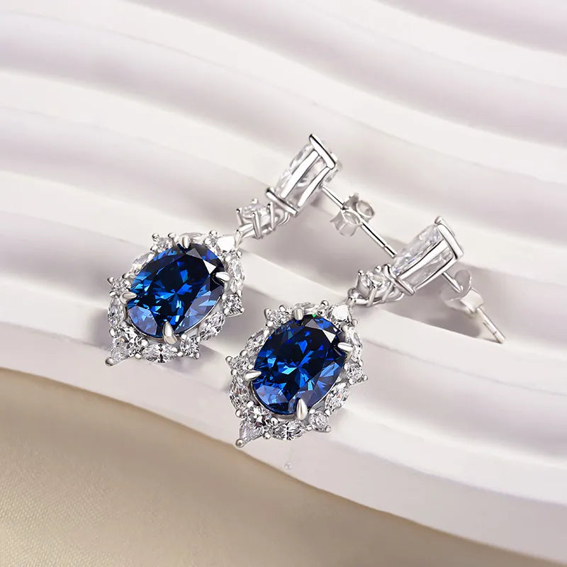 Luxurious Halo Oval Cut Blue Sapphire Women's Earrings In Sterling Silver